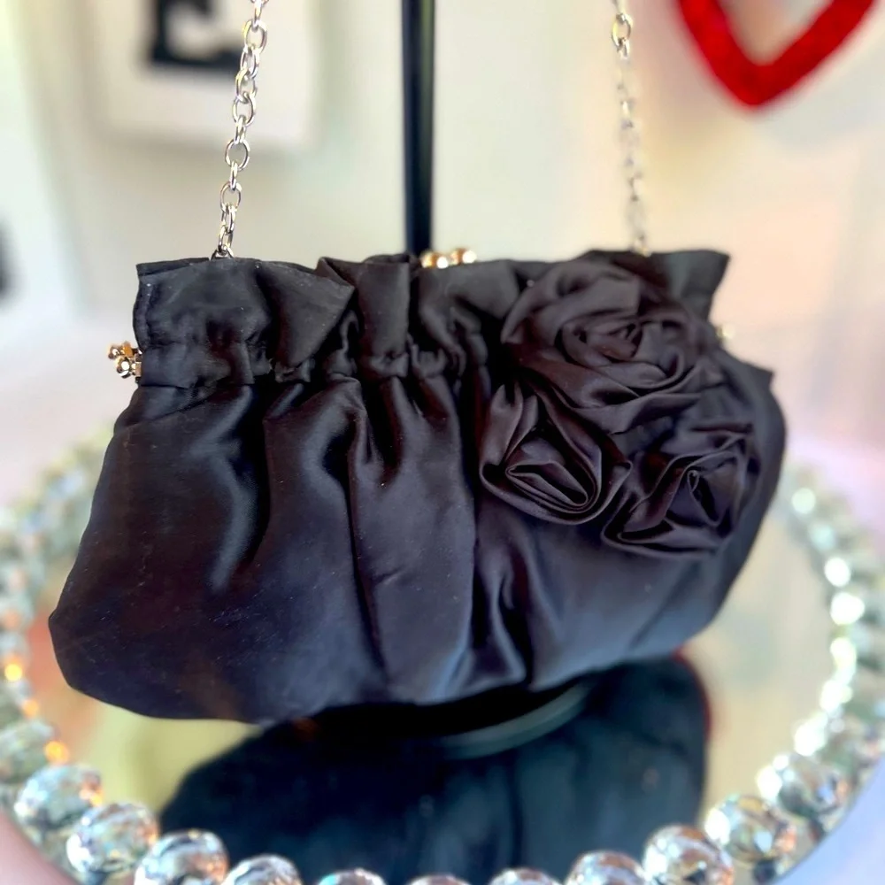 White House black market Chic Black Satin Clutch with Rosette Accent